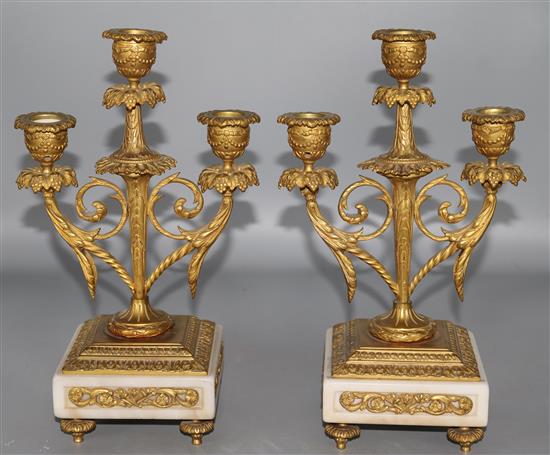 An ormolu and marble candelabra